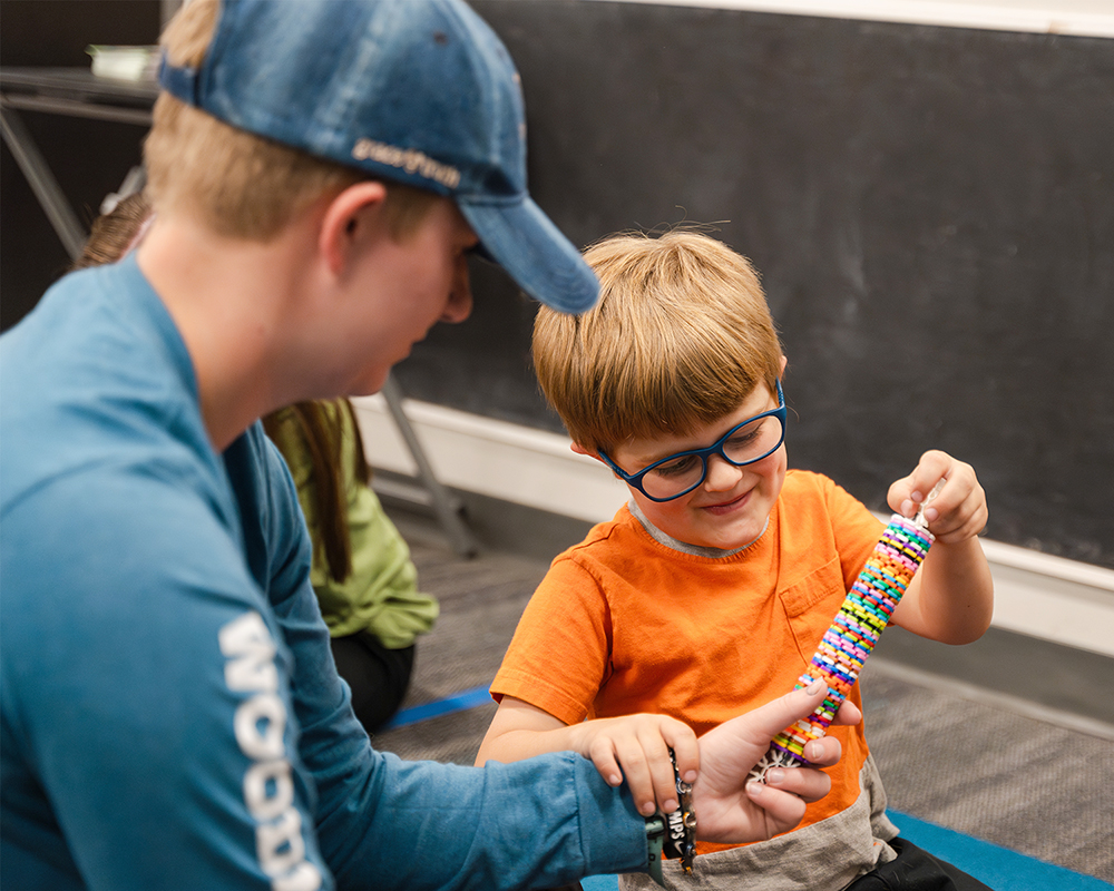 Access_July_2024-5Access,_little_boy,_playing,_Rockrimmon,_toy,_Woodmen_Valley.jpg